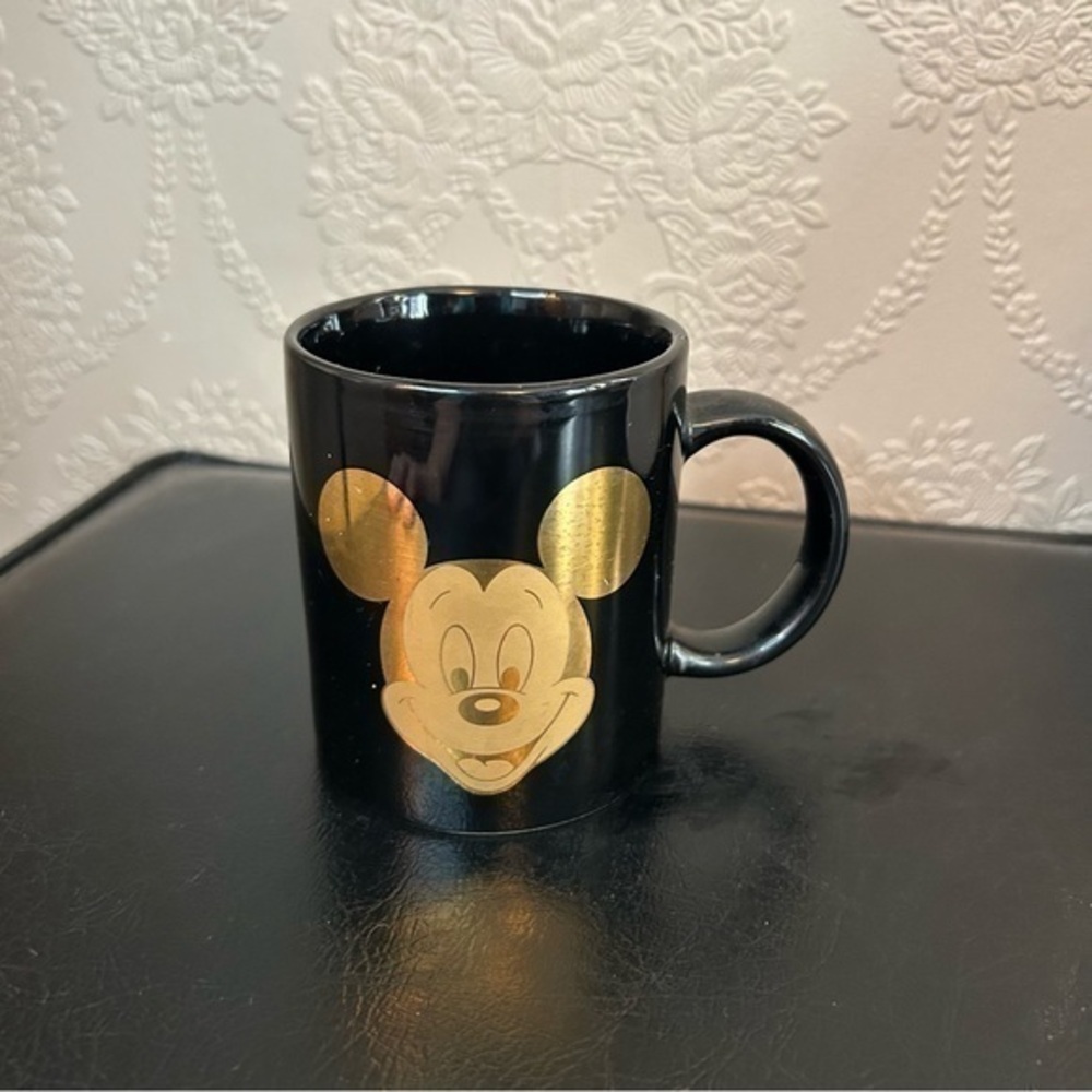 Disney Mickey mug gold black great condition approximately 3.75” high